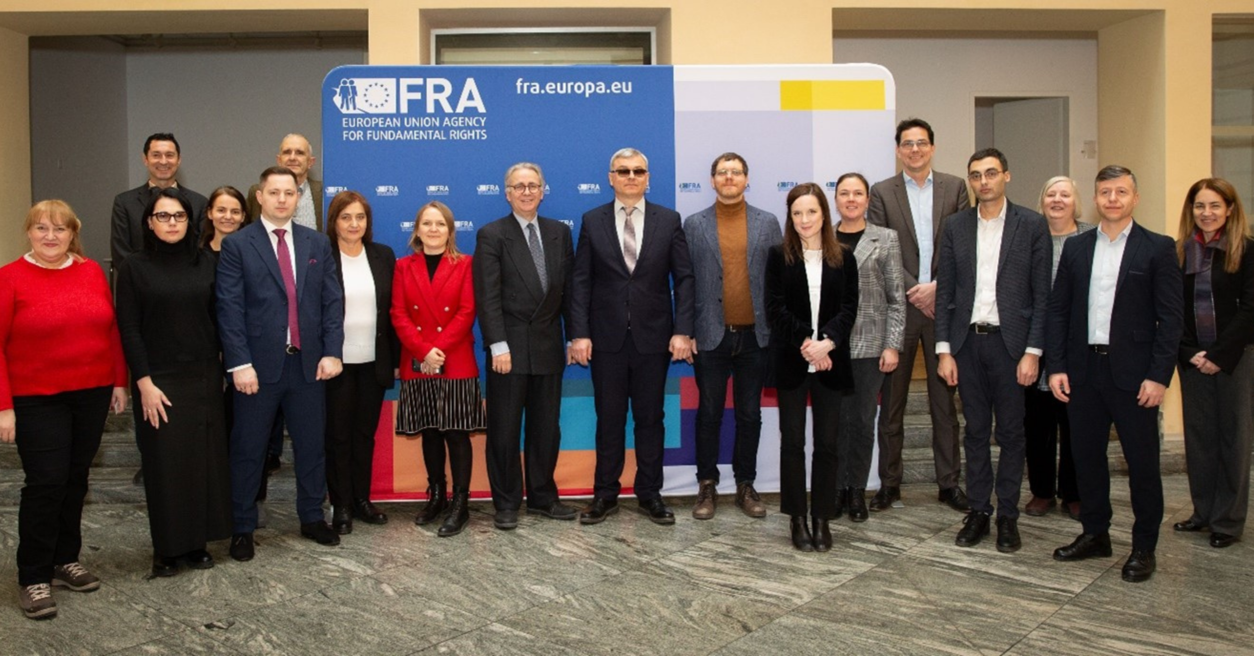 Photo showing Moldovan delegates, D4I and FRA representatives, in the FRA Atrium.