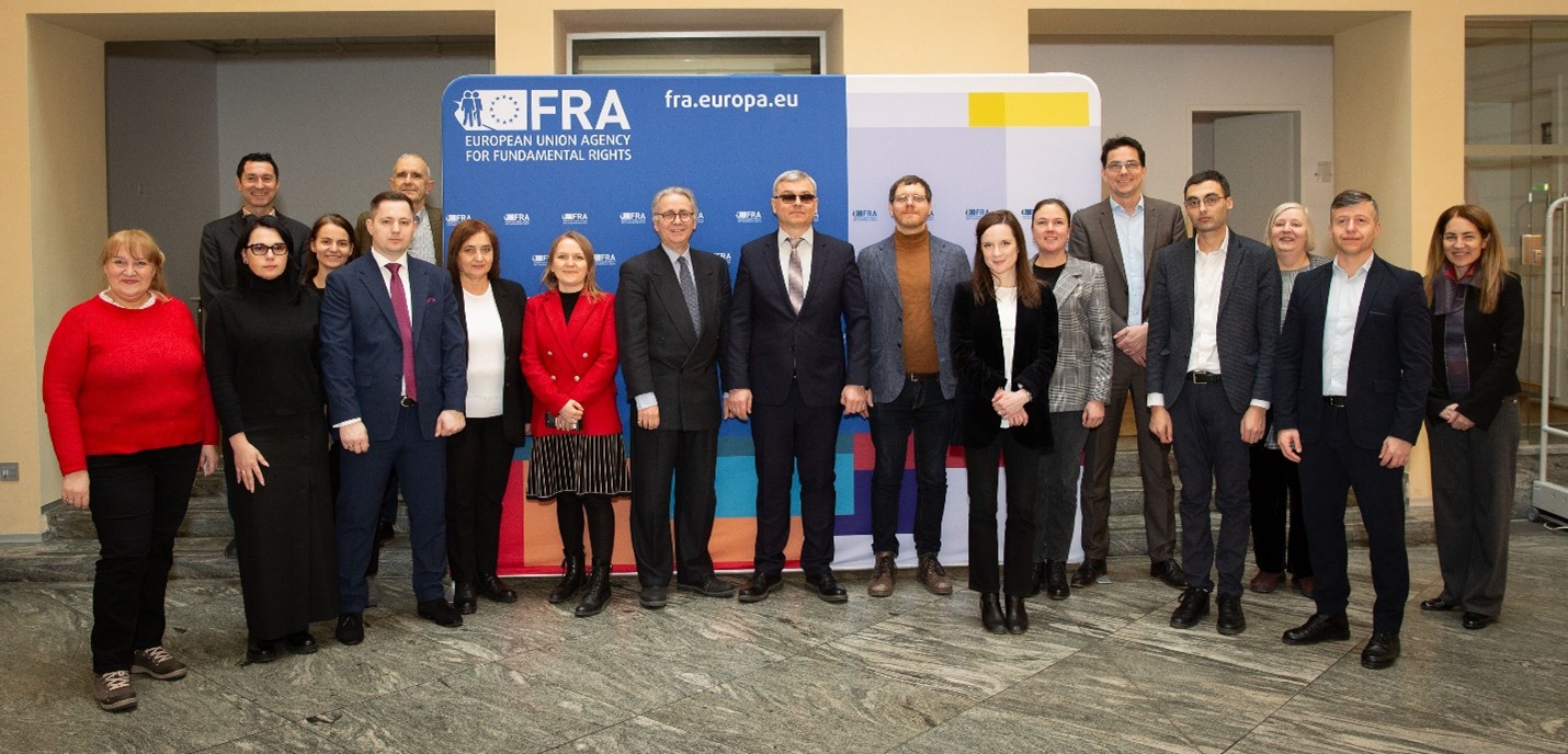 Photo showing Moldovan delegates, D4I and FRA representatives, in the FRA Atrium.